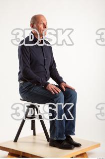 Sitting pose blue deep shirt jeans of Ed 0006
